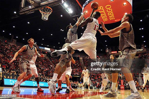 Winston Shepard of the San Diego State Aztecs shoots the ball in the second half of the game against Kamryn Williams of the Air Force Falons at...