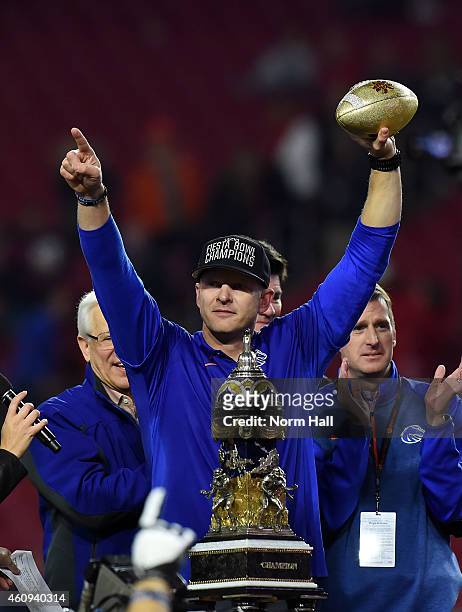 Head coach Bryan Harsin of the Boise State Broncos celebrates after beating the Arizona Wildcats 38-30 in the Vizio Fiesta Bowl at University of...