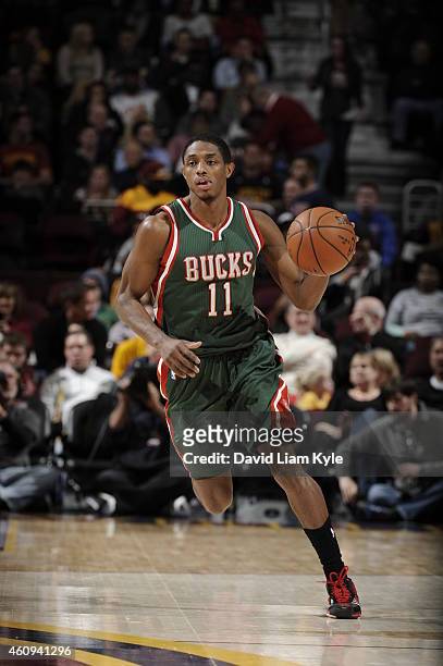 Brandon Knight of the Milwaukee Bucks brings the ball up court against the Cleveland Cavaliers on December 31, 2014 at The Quicken Loans Arena in...