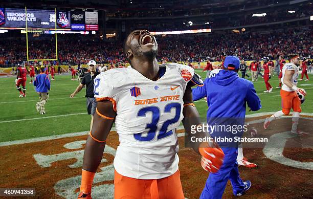 Boise State defensive end Rondell McNair celebrates at midfield after a 38-30 win against Arizona in the Vizio Fiesta Bowl at the University of...