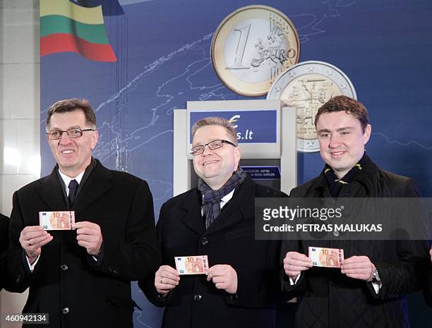Lithuanian Prime Minister Algirdas Butkevicius , Chairman of the Board of the Bank of Lithuania Vitas Vasiliauskas, and Estonian Prime Minister Taavi...