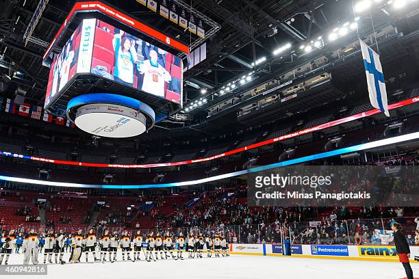 The Finland flag is raised after Team Finland defeated Team Germany in a preliminary round game during the 2015 IIHF World Junior Hockey...