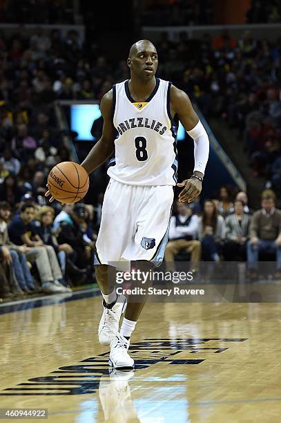 Quincy Pondexter of the Memphis Grizzlies brings the ball up court during a game against the San Antonio Spurs at the FedExForum on December 30, 2014...
