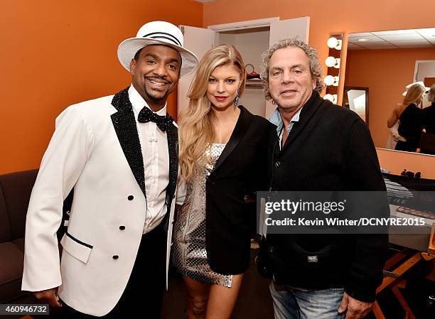 Actor Alfonso Ribeiro, singer Fergie and producer Larry Klein pose at Dick Clark's New Year's Rockin' Eve With Ryan Seacrest at CBS Television City...