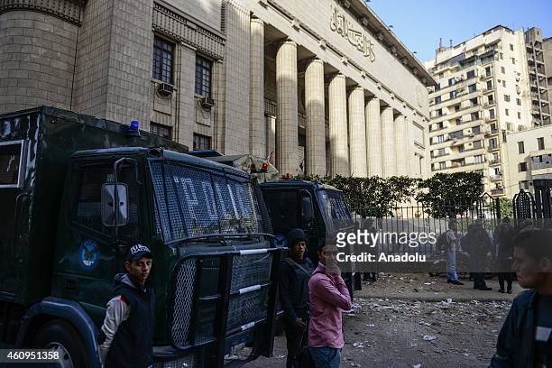 Egyptian riot policemen stand guard outside of High Court, downtown Cairo, Egypt on January 01, 2015. Egypt's highest appellate court ordered...