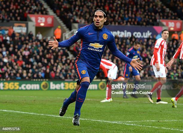 Radamel Falcao of Manchester United celebrates scoring his team's first goal during the Barclays Premier League match between Stoke City and...