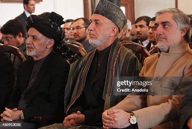 Afghan President Ashraf Ghani , former President Hamid Karzai and Chief Executive Officer Abdullah Abdullah attend a ceremony marking the formal...