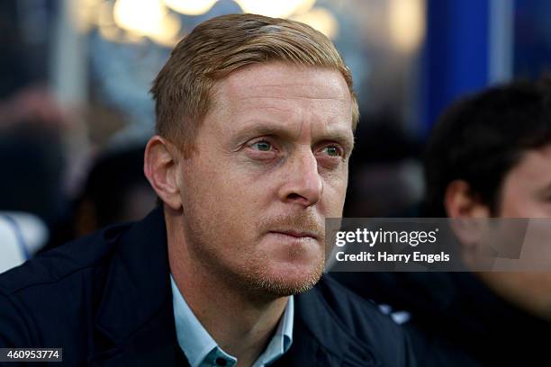 Garry Monk the manager of Swansea City looks on during the Barclays Premier League match between Queens Park Rangers and Swansea City at Loftus Road...