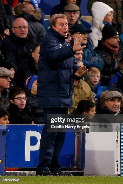 Harry Redknapp the manager of QPR directs his players during the Barclays Premier League match between Queens Park Rangers and Swansea City at Loftus...