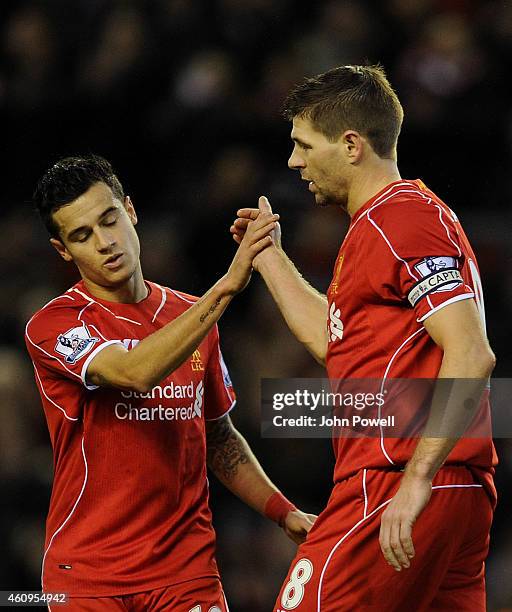 Steven Gerrard of Liverpool celebrates his second goal with Philippe Coutinho of Liverpool during the Barclays Premier League Match between Liverpool...