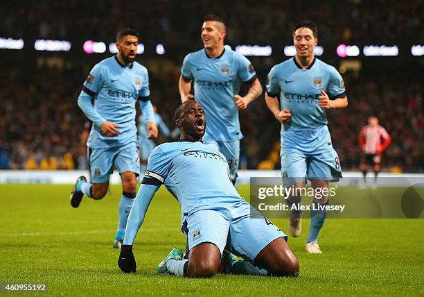 Yaya Toure of Manchester City celebrates the opening goal during the Barclays Premier League match between Manchester City and Sunderland at Etihad...
