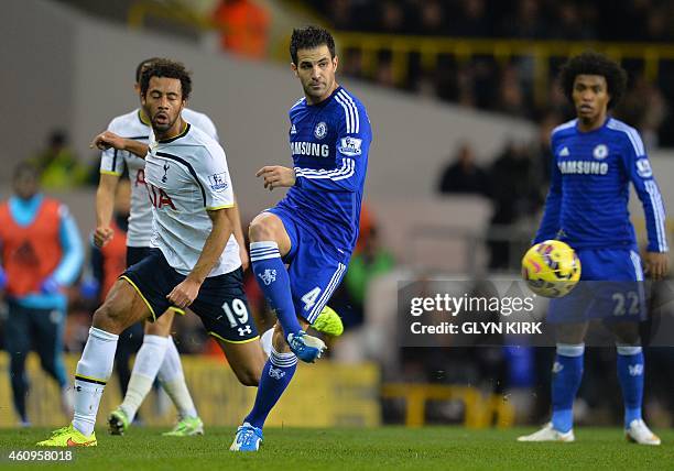 Chelsea's Spanish midfielder Cesc Fabregas passes the ball during the English Premier League football match between Tottenham Hotspur and Chelsea at...