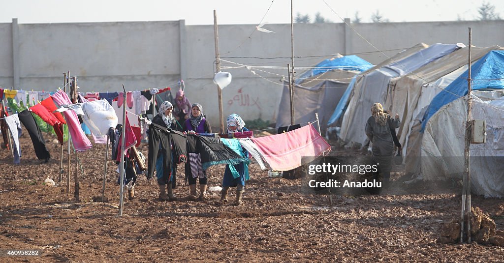 Syrians welcome new year in refugee camps