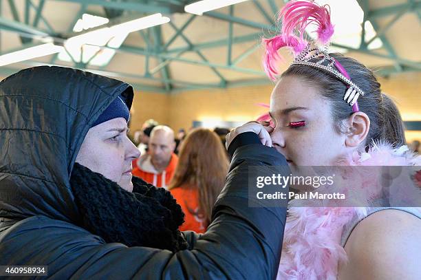 Several hundred swimmers brave the 24 degree Fahrenheit air temperature to participate in the L Street Brownies annual New Year's Day Boston Polar...