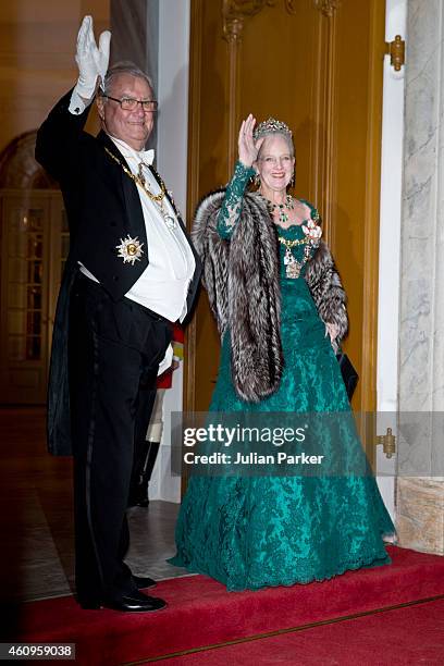 Prince Henrik of Denmark and Queen Margrethe of Denmark attend a New Years Levee and Banquet at Christian VII's Palace on January 1, 2015 in...