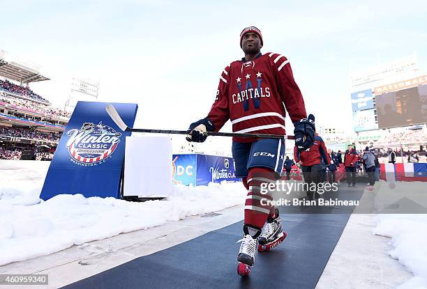 Joel Ward of the Washington Capitals walks to the locker room after warm-up prior to their 2015 Bridgestone NHL Winter Classic game against the...