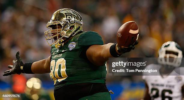 LaQuan McGowan of the Baylor Bears runs for a touchdown after the catch against the Michigan State Spartans during the second half of the Goodyear...