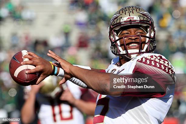 Quarterback Jameis Winston of the Florida State Seminoles warms up prior to the College Football Playoff Semifinal at the Rose Bowl Game presented by...
