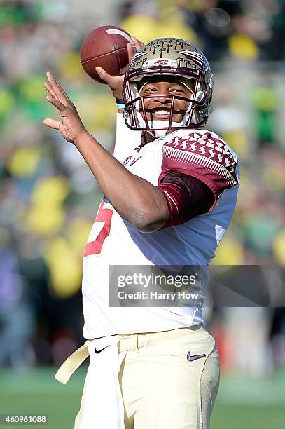 Quarterback Jameis Winston of the Florida State Seminoles warms up prior to the College Football Playoff Semifinal at the Rose Bowl Game presented by...