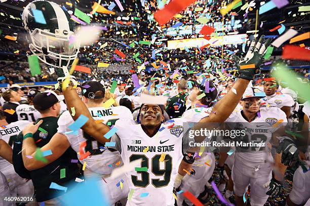 Jermaine Edmondson of the Michigan State Spartans celebrates a 42-41 win against the Baylor Bears during the Goodyear Cotton Bowl Classic at AT&T...