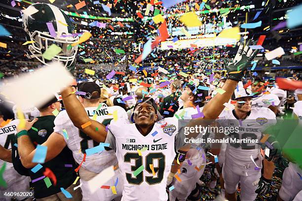 Jermaine Edmondson of the Michigan State Spartans celebrates a 42-41 win against the Baylor Bears during the Goodyear Cotton Bowl Classic at AT&T...