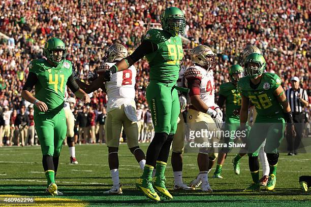 Linebacker Christian French of the Oregon Ducks celebrates after scoring a two-point conversion against the Florida State Seminoles during the...