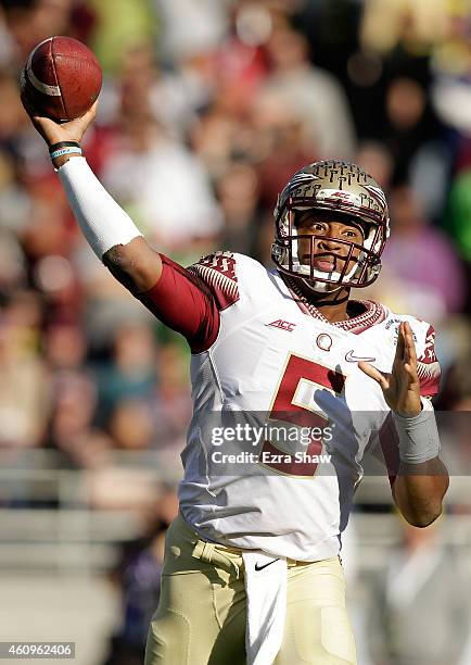 Quarterback Jameis Winston of the Florida State Seminoles passes against the Oregon Ducks during the College Football Playoff Semifinal at the Rose...