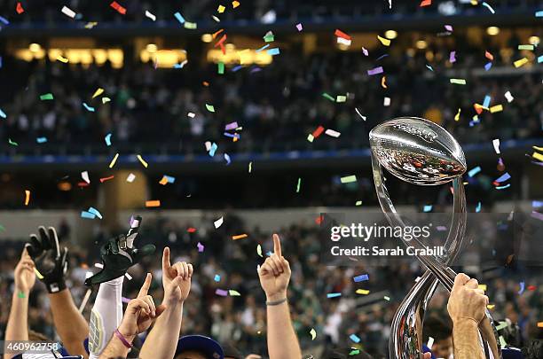 The Michigan State Spartans celebrate after defeating the Baylor Bears during the Goodyear Cotton Bowl Classic at AT&T Stadium on January 1, 2015 in...