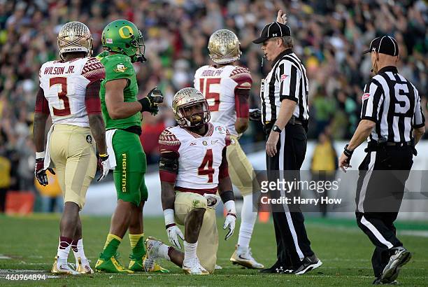 Running back Dalvin Cook of the Florida State Seminoles reacts after losing a fumble to the Oregon Ducks in the third quarter of the College Football...