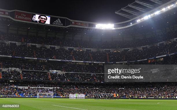 Real Madrid CF and RC Celta de Vigo players hold a minute of silence in memory of the Portuguese player Eusebio prior to the start of the La Liga...