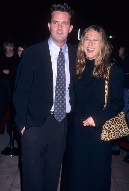 Actor Matthew Perry and actress Jennifer Aniston attend the "Kissing a Fool" Westwood Premiere on February 18, 1998 at the Mann Plaza Theatre in...