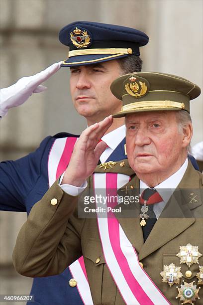 Prince Felipe of Spain and King Juan Carlos of Spain attend the New Year's Military Parade at the Royal Palace on January 6, 2014 in Madrid, Spain.