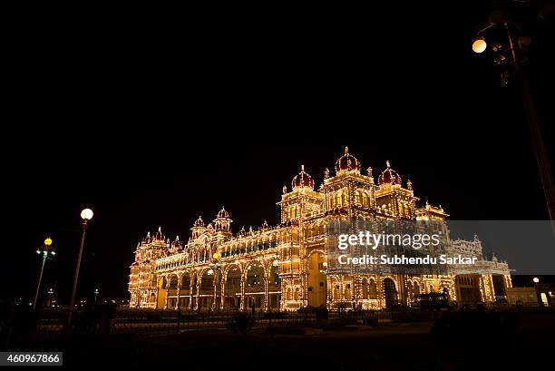 View of Mysore Palace lit at night. The Palace of Mysore is the official residence and seat of the Wodeyars the Maharajas of Mysore, the former royal...