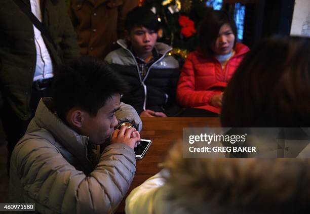 Relatives of victims of the New Year's Eve stampede gather in Shanghai on January 2, 2015. The New Year's stampede just before midnight on Shanghai's...