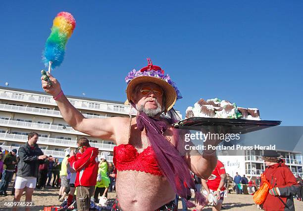 George Stanley of Greene musters up some excitement before the annual Special Olympics Lobster Dip race for the Atlantic in Old Orchard Beach...
