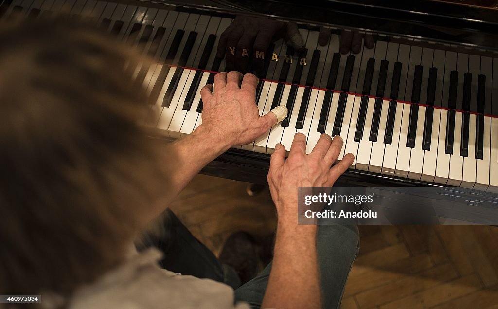 Experienced piano renovator Joel Jobe in Ankara State Conservatory in Turkey