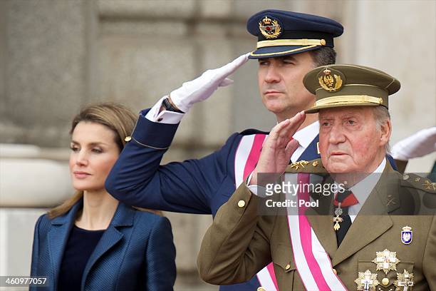 Princess Letizia of Spain, Prince Felipe of Spain and King Juan Carlos of Spain attend the New Year's Military Parade at the Royal Palace on January...