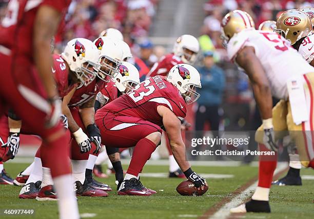 Center Lyle Sendlein of the Arizona Cardinals prepares to snap the football during the NFL game against the San Francisco 49ers at the University of...