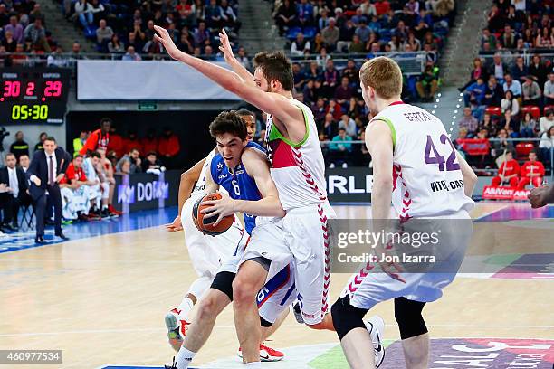 Cedi Osman, #6 of Anadolu Efes Istanbul competes with Mirza Begic, #15 of Laboral Kutxa Vitoria during the Euroleague Basketball Top 16 Date 1 game...