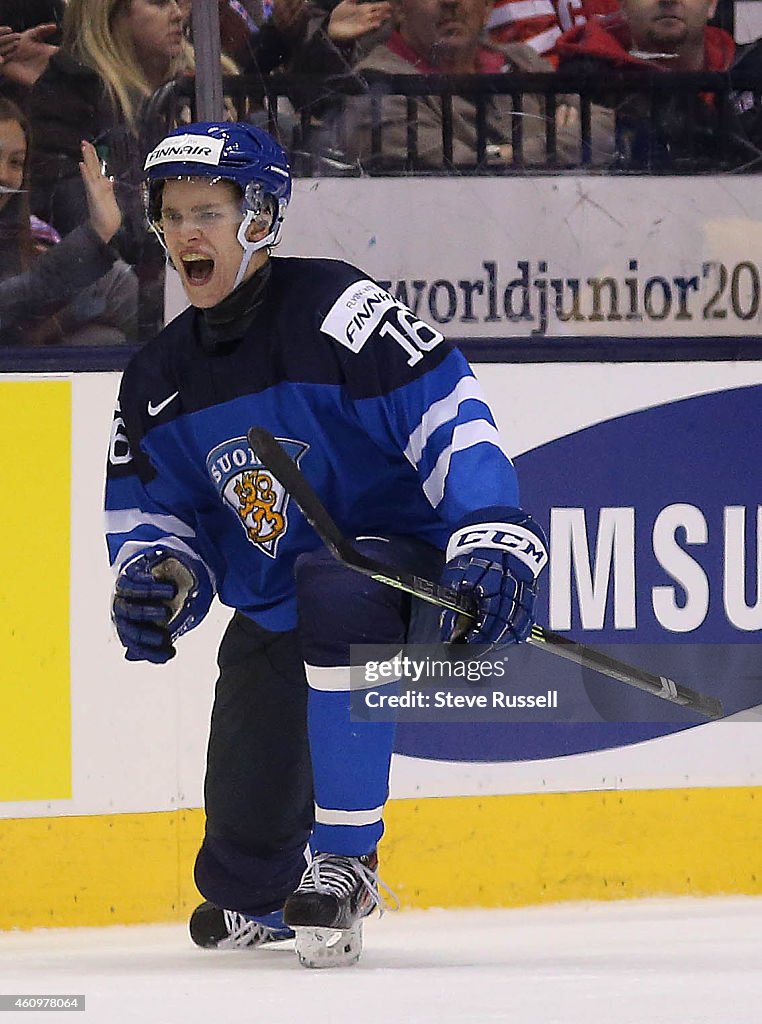 Team Sweden plays Finland in the quarter final round of the IIHF World Junior Hockey Tournament