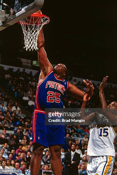 Oliver Miller of the Detroit Pistons dunks during a game played circa 1995 at the Oakland Coliseum in Oakland, California. NOTE TO USER: User...