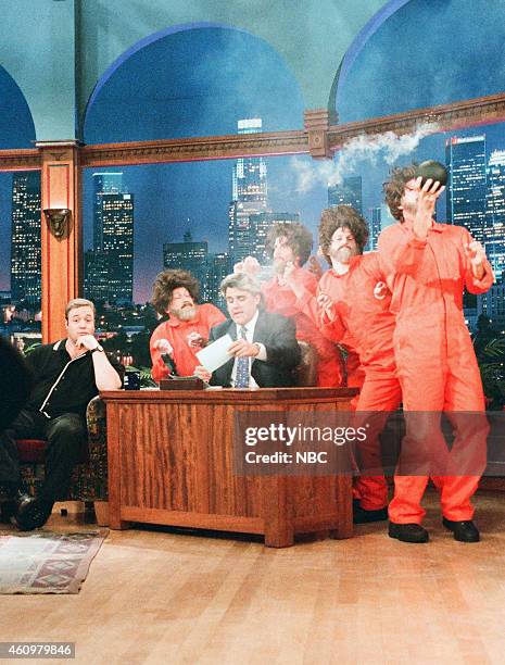 Episode 909 -- Pictured: Comedian Kevin James, host Jay Leno, and the dancing unibombers on April 25, 1996 --