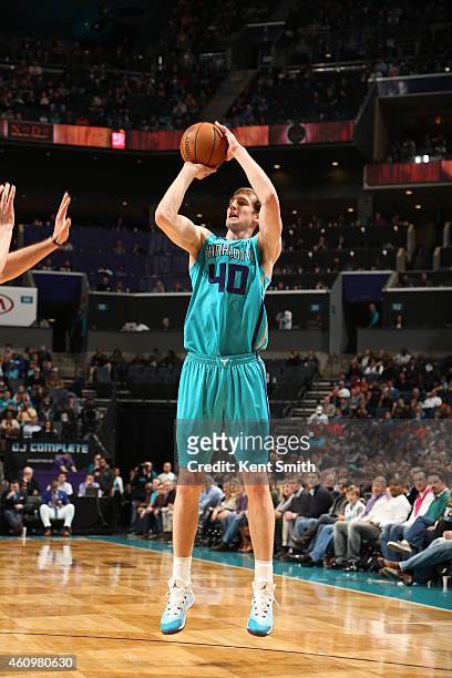 Cody Zeller of the Charlotte Hornets shoots against the Cleveland Cavaliers during the game at the Time Warner Cable Arena on January 2, 2015 in...
