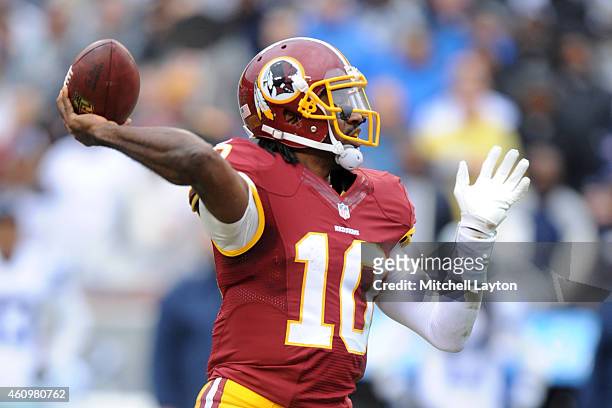 Quarterback Robert Griffin III of the Washington Redskins throws a pass during a NFL football game against the Dallas Cowboys at FedExField on...