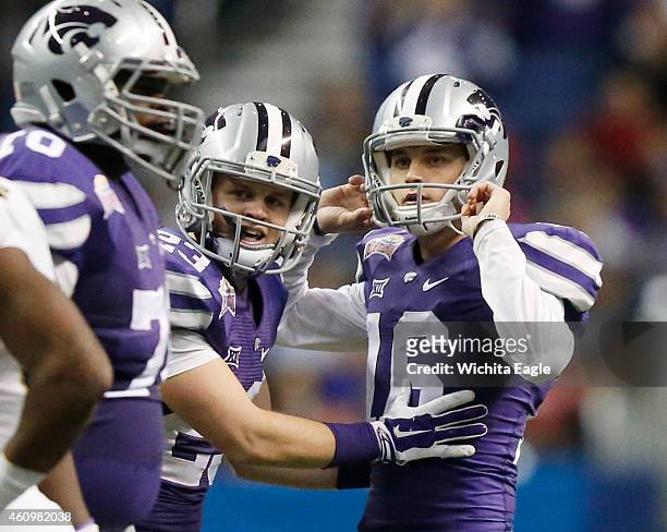 Kansas State kicker Matthew McCrane watches to see if his field goal is good in the second quarter against UCLA in the Valero Alamo Bowl at the...