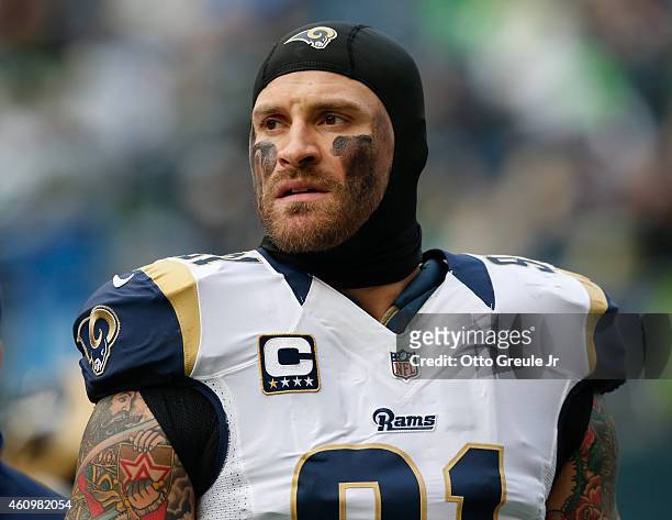 Defensive end Chris Long of the St. Louis Rams looks on prior to the game against the Seattle Seahawks at CenturyLink Field on December 28, 2014 in...