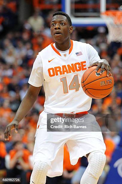 Kaleb Joseph of the Syracuse Orange controls the ball against the Long Beach State 49ers during the second half at the Carrier Dome on December 28,...