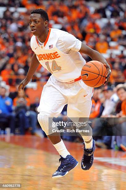 Kaleb Joseph of the Syracuse Orange controls the ball against the Long Beach State 49ers during the second half at the Carrier Dome on December 28,...