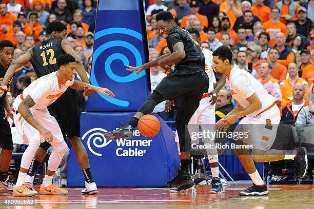 Chris McCullough of the Syracuse Orange, David Samuels of the Long Beach State 49ers and Michael Gbinije of the Syracuse Orange react to a loose ball...