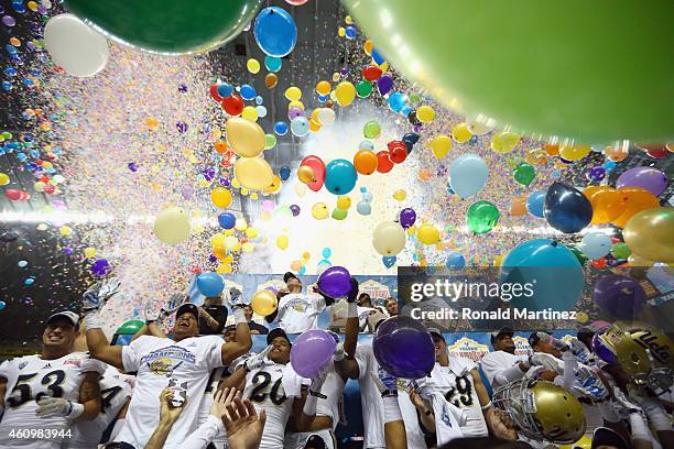 The UCLA Bruins celebrate their 40-35 win against the Kansas State Wildcats during the Valero Alamo Bowl at Alamodome on January 2, 2015 in San...